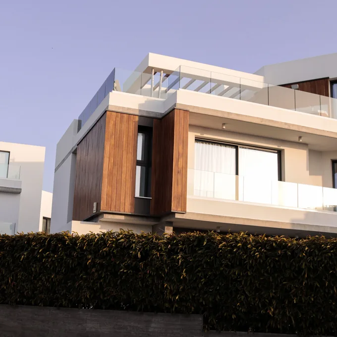 Contemporary white villa with timber facade